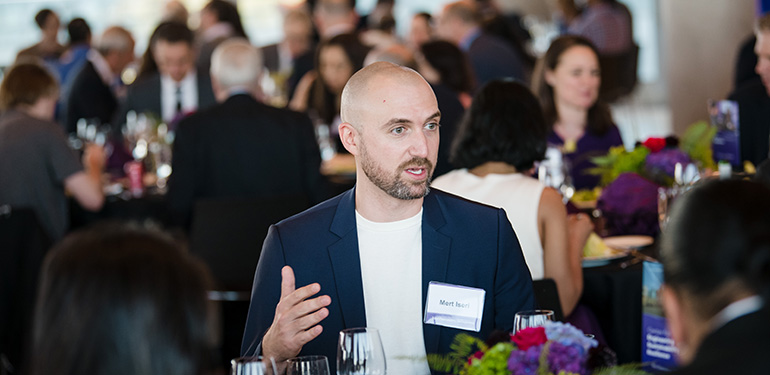 Your ties to Northwestern and McCormick last beyond graduation. Pictured: Mert Iseri (’11) attends an event on campus in 2023.