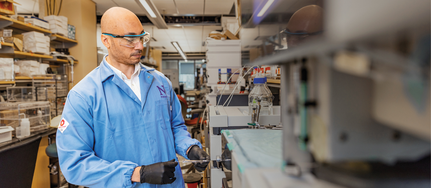 Professor Evan Scott working in the lab