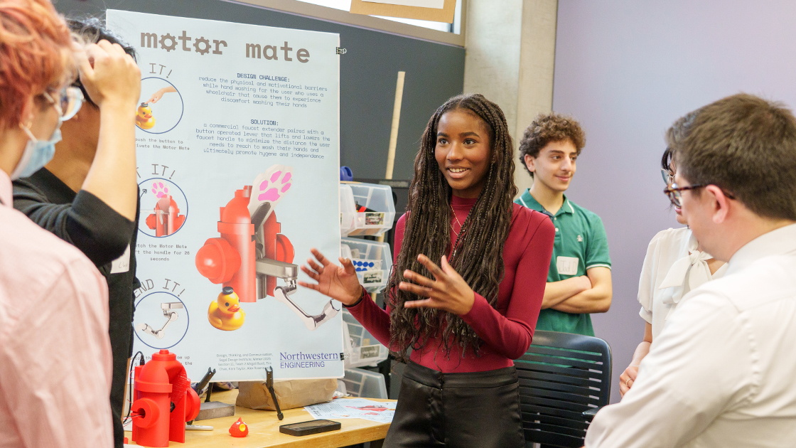A DTC student presents Motor Mate.